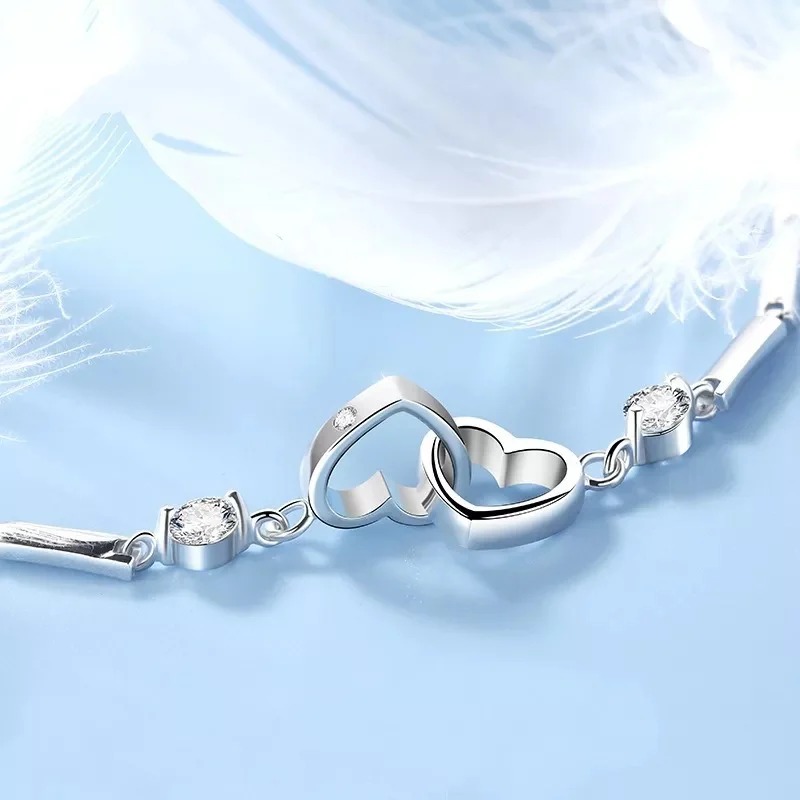 CLAMPED HEARTS BRACELET