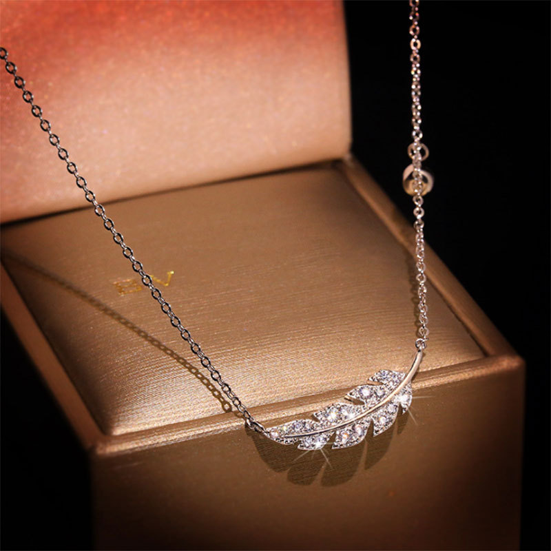 ircon feather necklace
